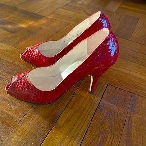 Bruno Magli red open-toed heels. Size 8. Worn but in very good condition!